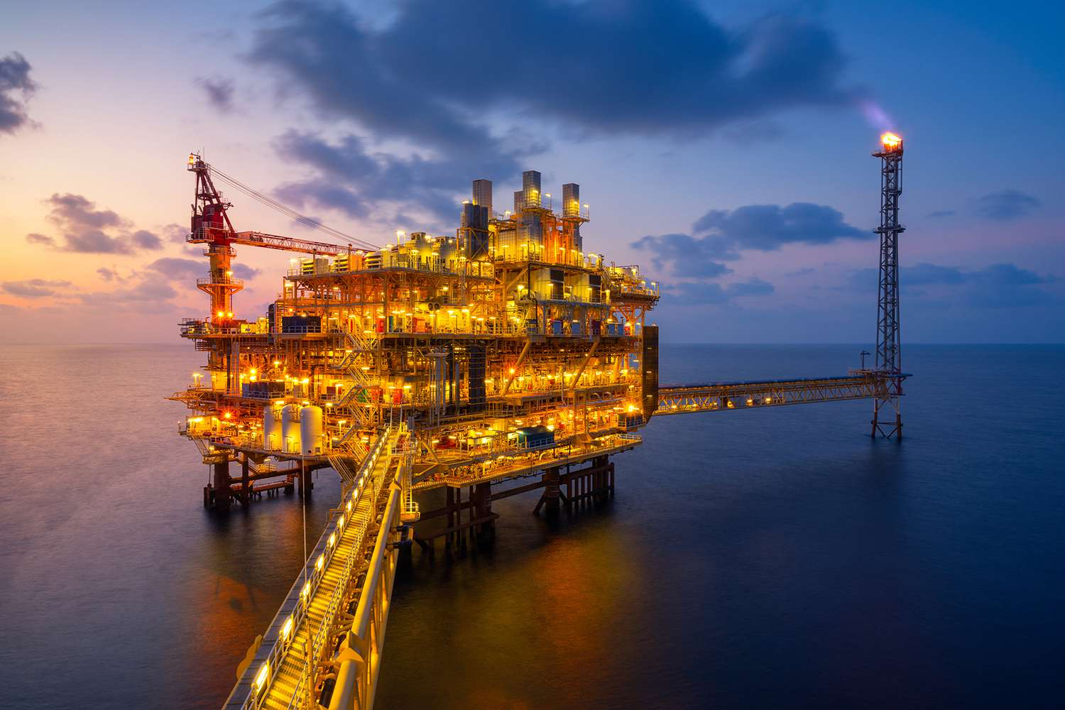 Offshore oil and energy platform at dusk